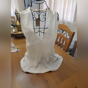 Womens sleevless top with camisole in a size Medium